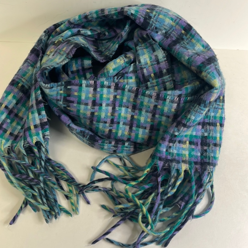 Soft acrylic plaid fringe end scarf.